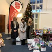 FESTIVE: L-R Sarah Woodward, Lucy Williamson and India McClure
