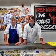 Philip Bell with his father, Tony, at their business, Bells Fishmongers