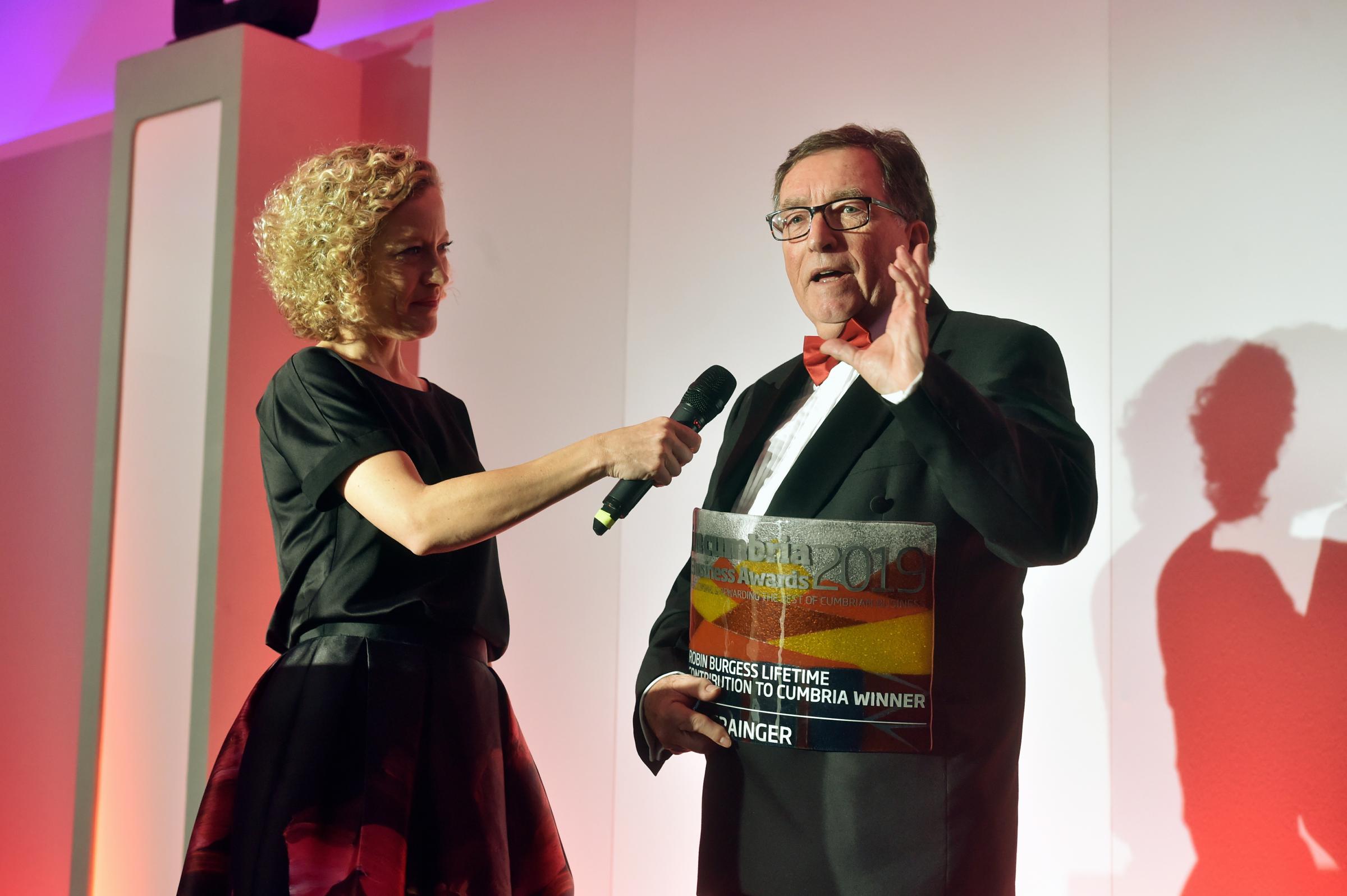 The in-cumbria Business Awards 2019, at The Halston, Carlisle, 14 November 2019...Guest speaker and compere Cathy Newman with John Grainger, executive director of Britains Energy Coast Business Cluster and winner of The Robin Burgess Lifetime