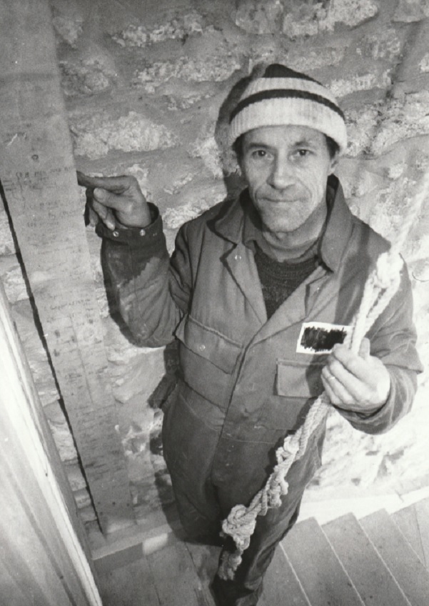 THE NAMES RING A BELL... Jim Boulton in January 1998 with a piece of wood from the bell tower containing names of bellringers from bygone days
