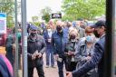 Anticipation: Spectators queue to enter the course for today's meeting 			          Photos: John Grossick on behalf of Racing Post