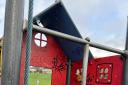 Graffiti tags cover play equipment in Sandylands