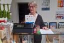 OPEN: Barbara Cairnes behind the till at the new Eco Shop in Scott Street