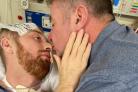 OPERATION: Danny Hodgson, pictured in November with dad Peter, in a photo released by his family