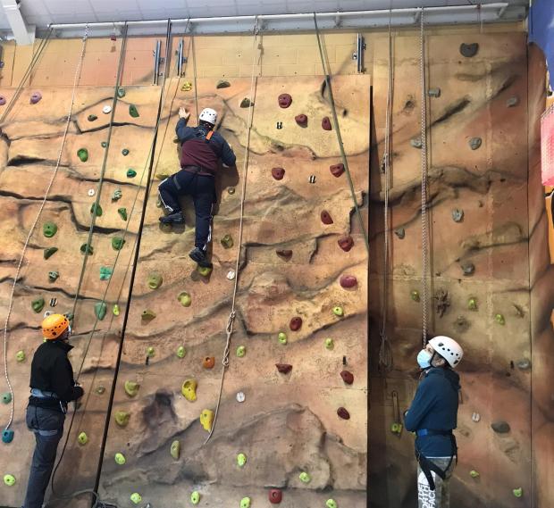 In Cumbria: Group climbing at Calvert Trust 