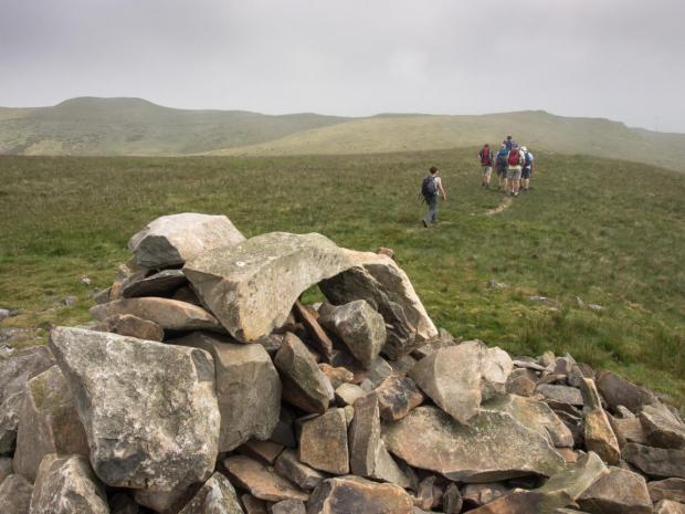 In Cumbria: Walkers on Barbon Low Fell