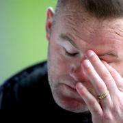 Wayne Rooney breaks silence over viral hotel photos . (PA)