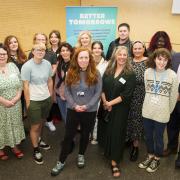 Trainees, David Beeby and others  involved in the Better Tomorrows anniversary event