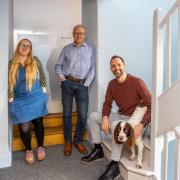 Promoted to associate architects are Amy Redman, Andrew Bodenham, Gordon Blunt. Pictured with Tess the dog